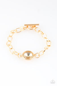 She sparkles on-gold/All Aglitter-gold