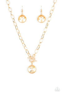 She sparkles on-gold/All Aglitter-gold